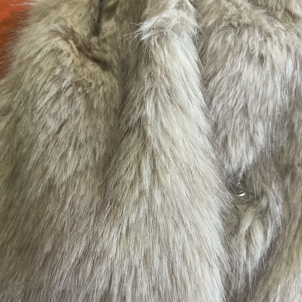 Woman’s faux fur jacket size L  color is as you see mixed beiges .